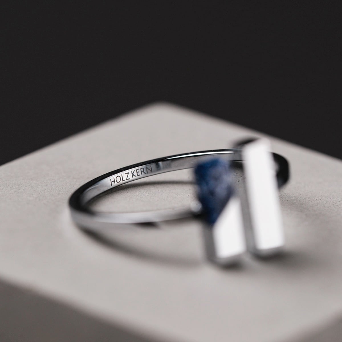 "Campania Ring", elegant silver ring with lapis lazuli accent, modern minimalist design.