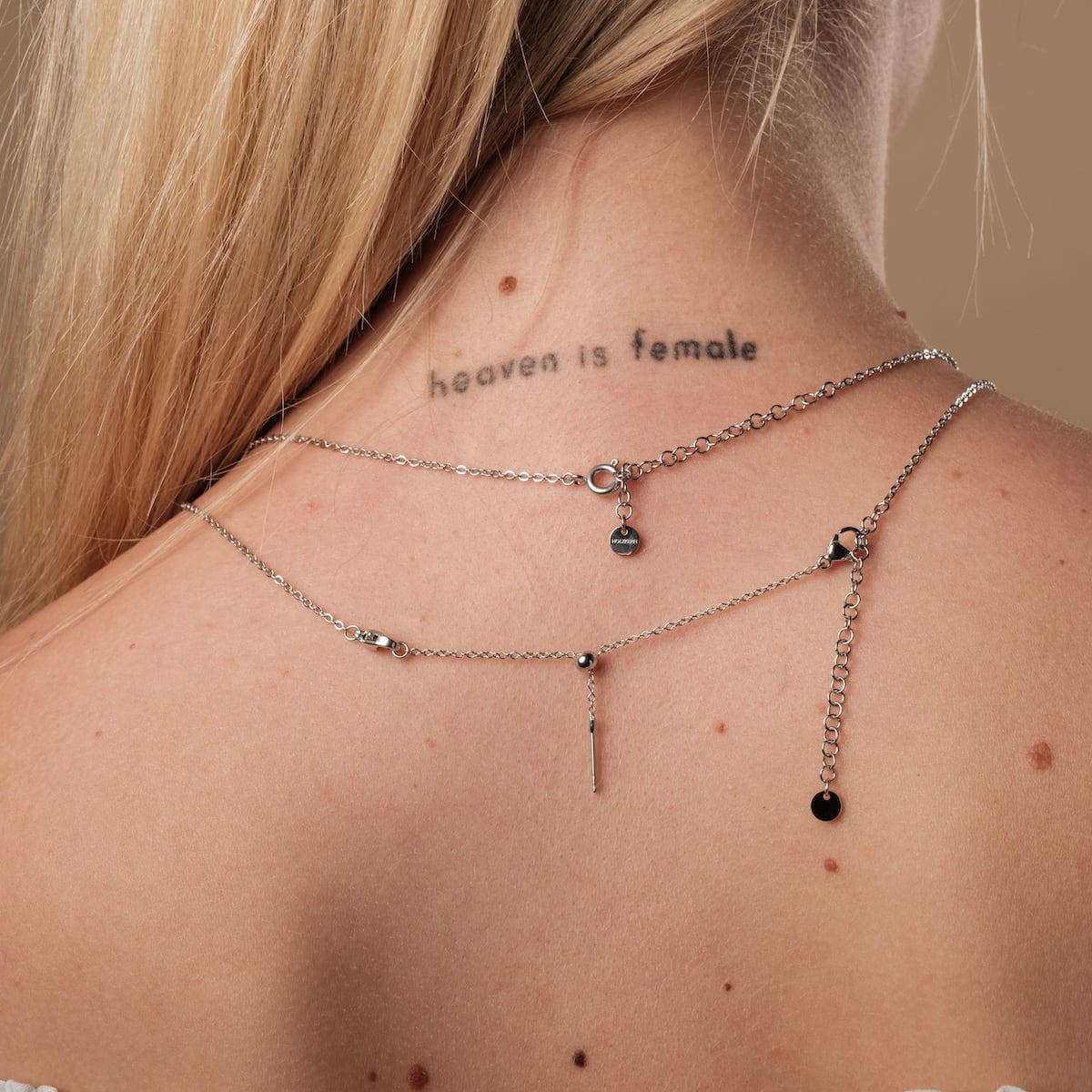 "Jewelry Extender", silver jewelry extender, enhances necklace length with elegant, adjustable style (4-8 cm).