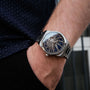 "Spikes watch featuring a lapis lazuli and maple design with a sleek, modern style."