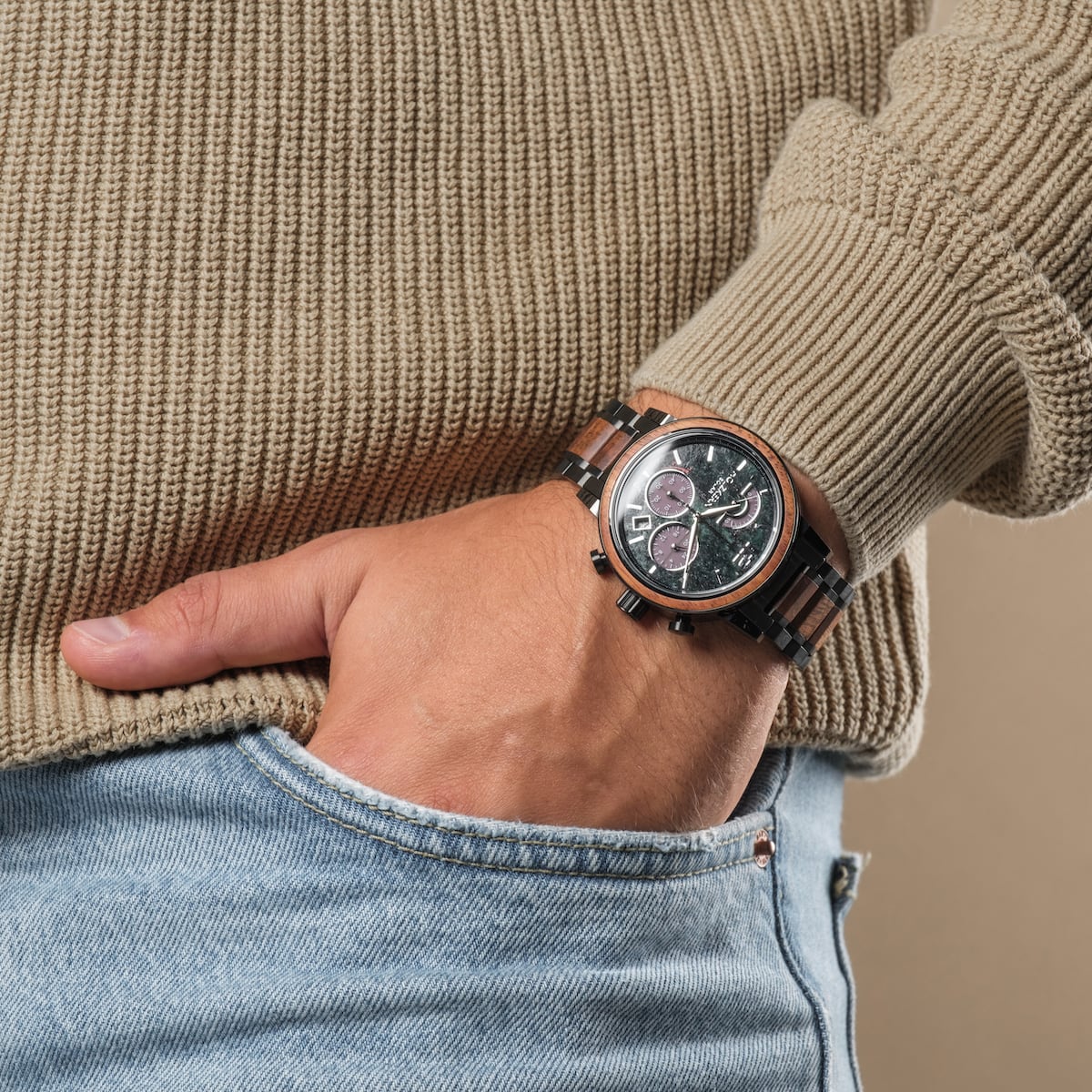 "Scattered" wristwatch featuring marble and koa design on a casual outfit.