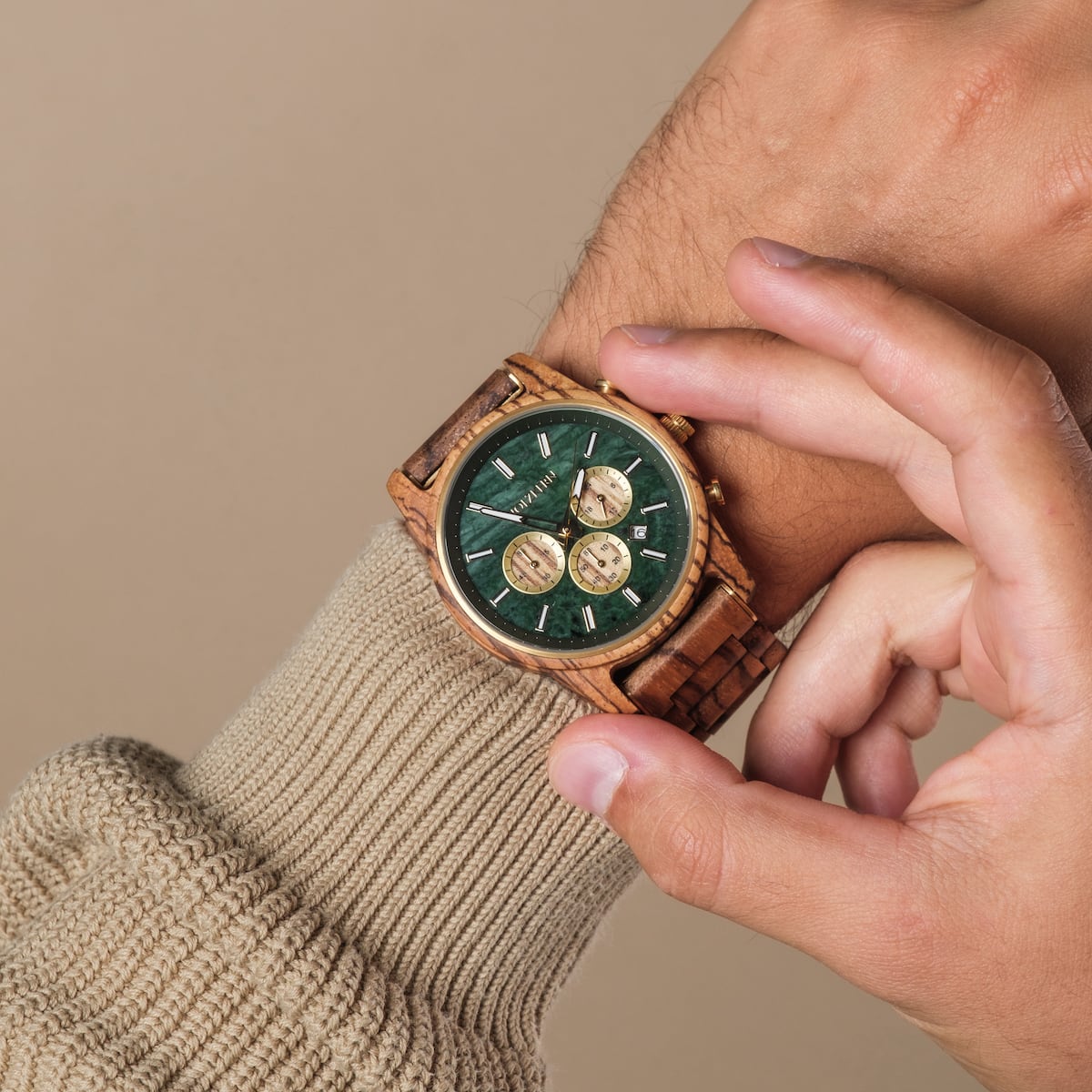 "Canopy" watch, crafted with Zebrawood and Marble, featuring a striking green dial and elegant design.