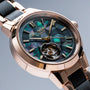 "Luminaire", a luxurious watch featuring a nacre and maple motif with a polished, intricate design.