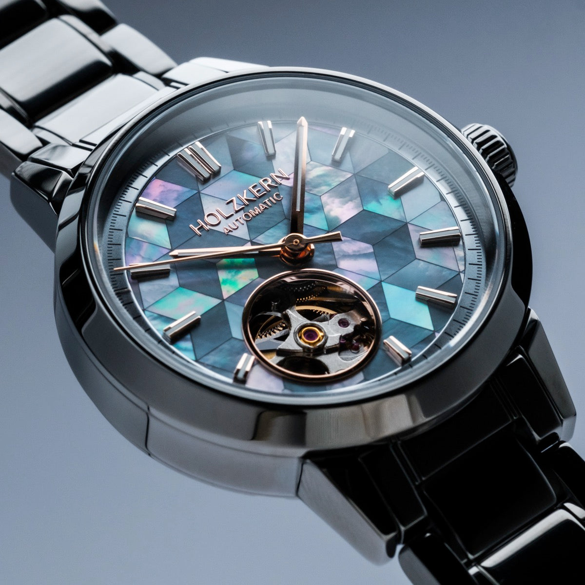 "Mirrordance", a stylish watch featuring a nacre and ceramic design with an intricate geometric pattern.