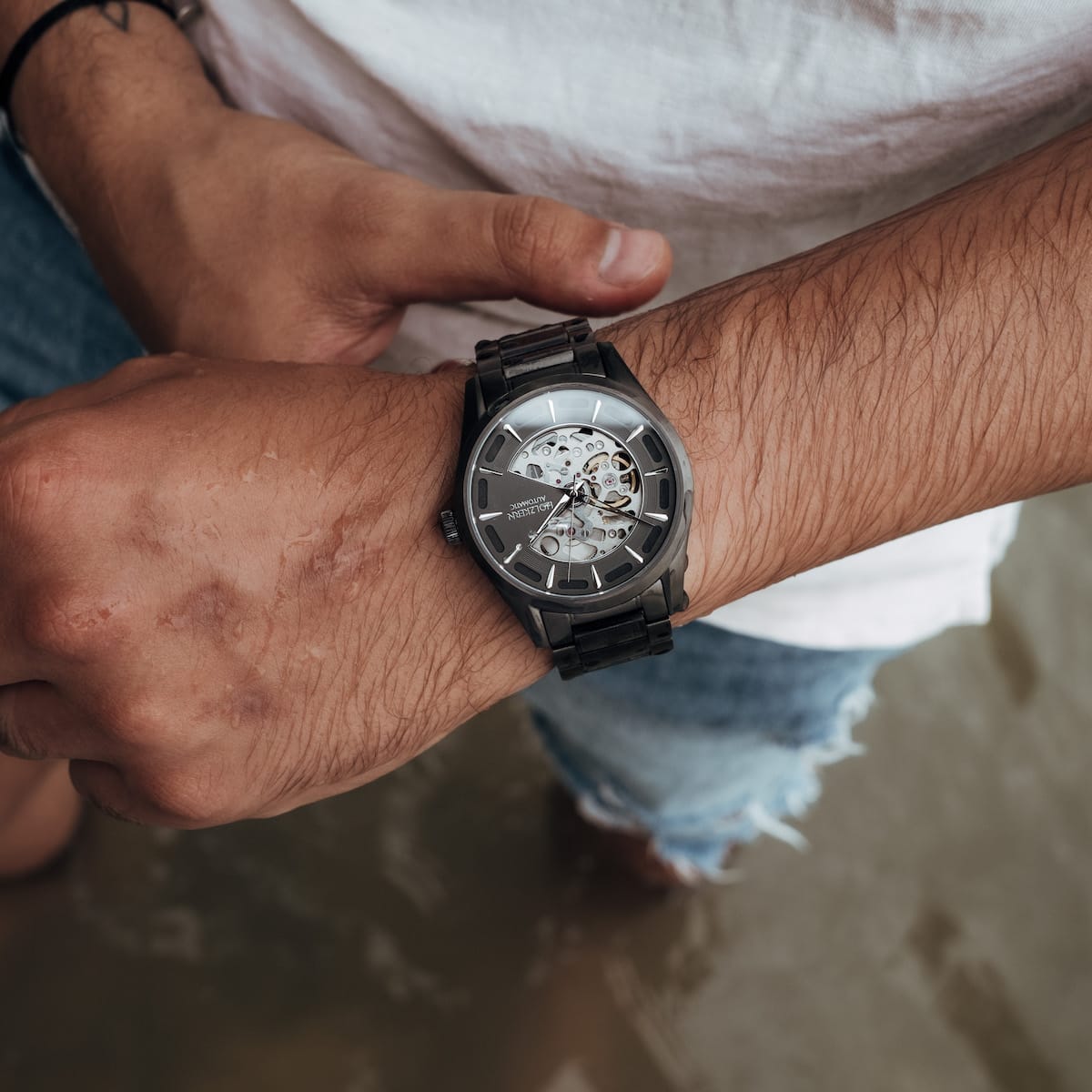 "Morasko" men's watch in maple and dark gray tones, elegant skeleton dial design.