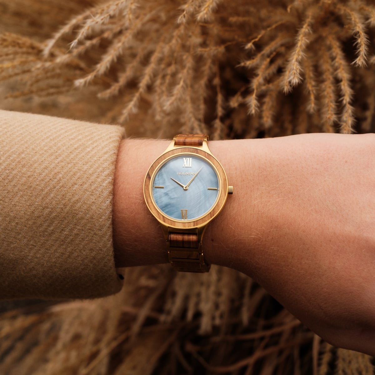 "Capri" watch featuring a warm brown and gold color scheme with a natural, elegant style.