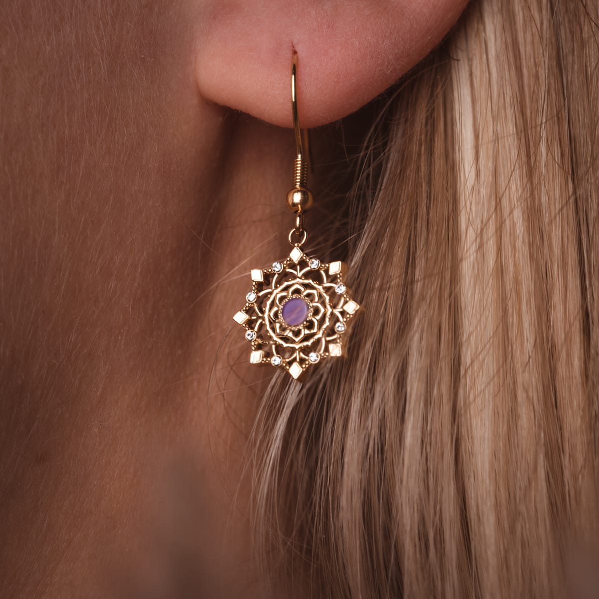 "Aphonia Earrings", elegant earrings with amethyst set in gold, featuring intricate patterns and a luxurious look.