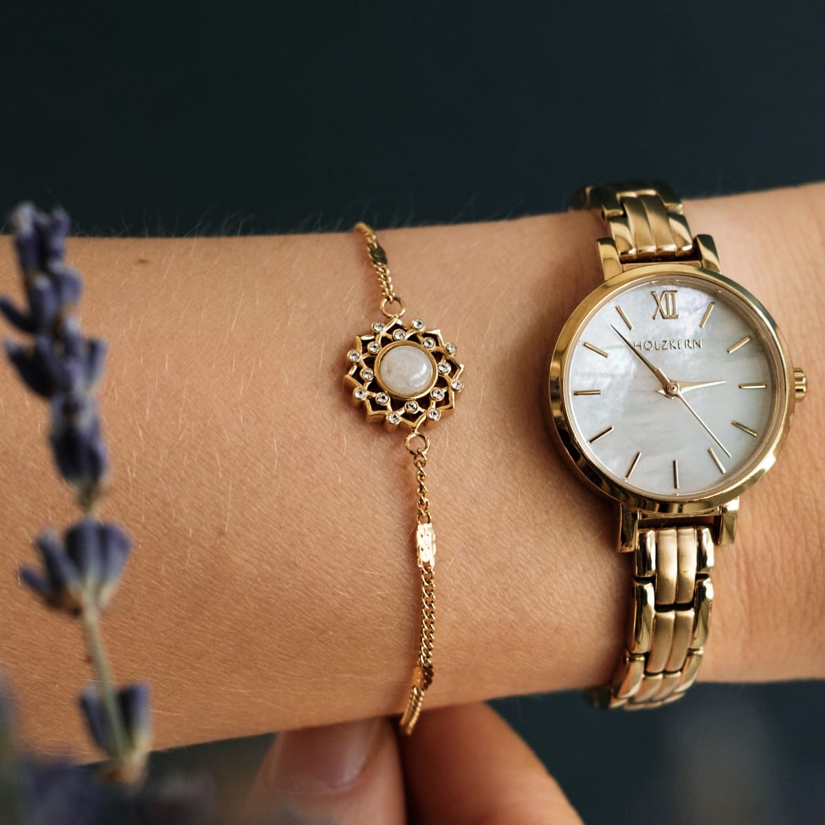 "Composition Gem Bracelet": Elegant bracelet featuring moonstone and gold accents on a delicate chain.