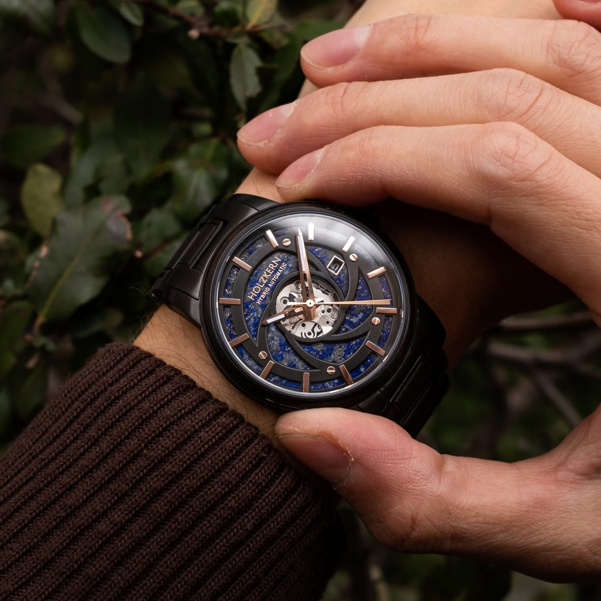 "Seaburst" watch featuring a Maple/Lapis Lazuli style with sleek design elements.