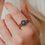 "Spectral Ring" - a stylish ring featuring blue nacre and gold, showcasing an elegant and modern aesthetic.