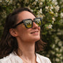 "The Exquisite sunglasses featuring a Leadwood/Khaki Dust design with a stylish and reflective finish."
