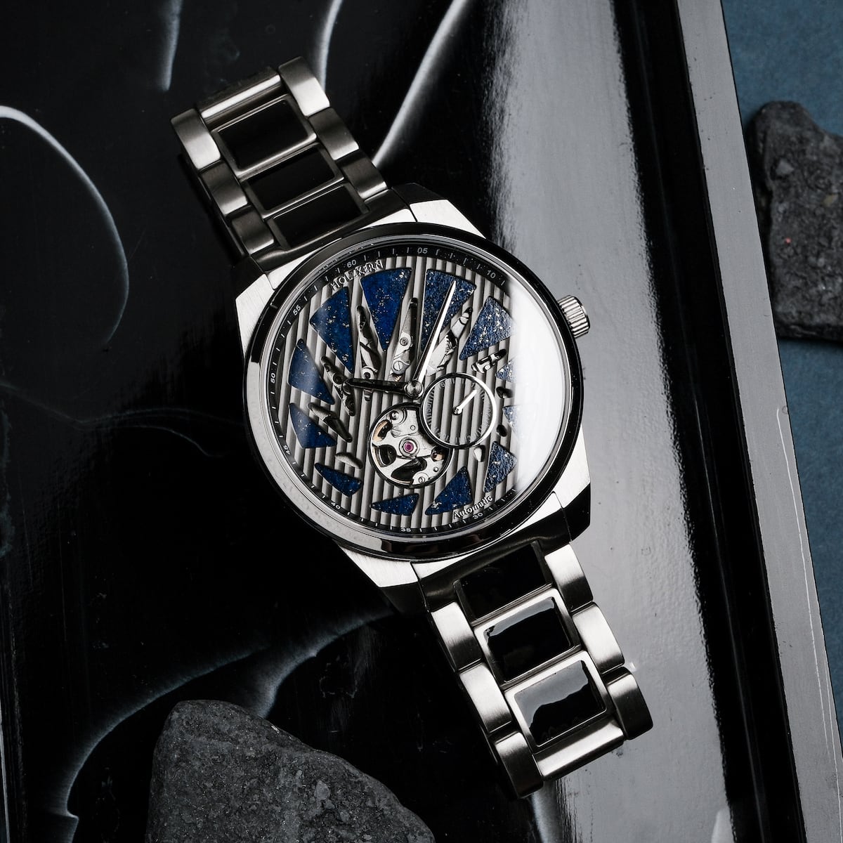"Spikes, a striking watch with Lapis Lazuli and Maple accents, showcases an intricate and bold design."