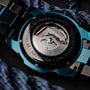 "Glaciersurge" watch, crafted with stainless steel, showcasing an intricate mechanical design.
