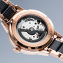 "Luminaire" watch with a rose gold finish and intricate mechanical design.