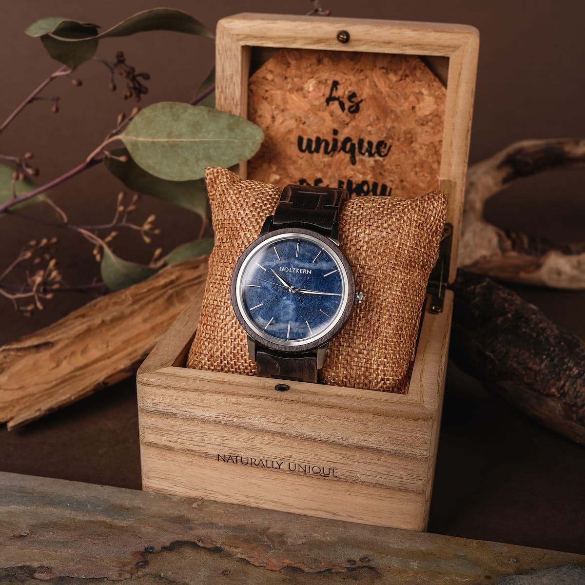 "Immanuel" watch featuring a maple and sodalite design, displayed in a rustic wooden box.