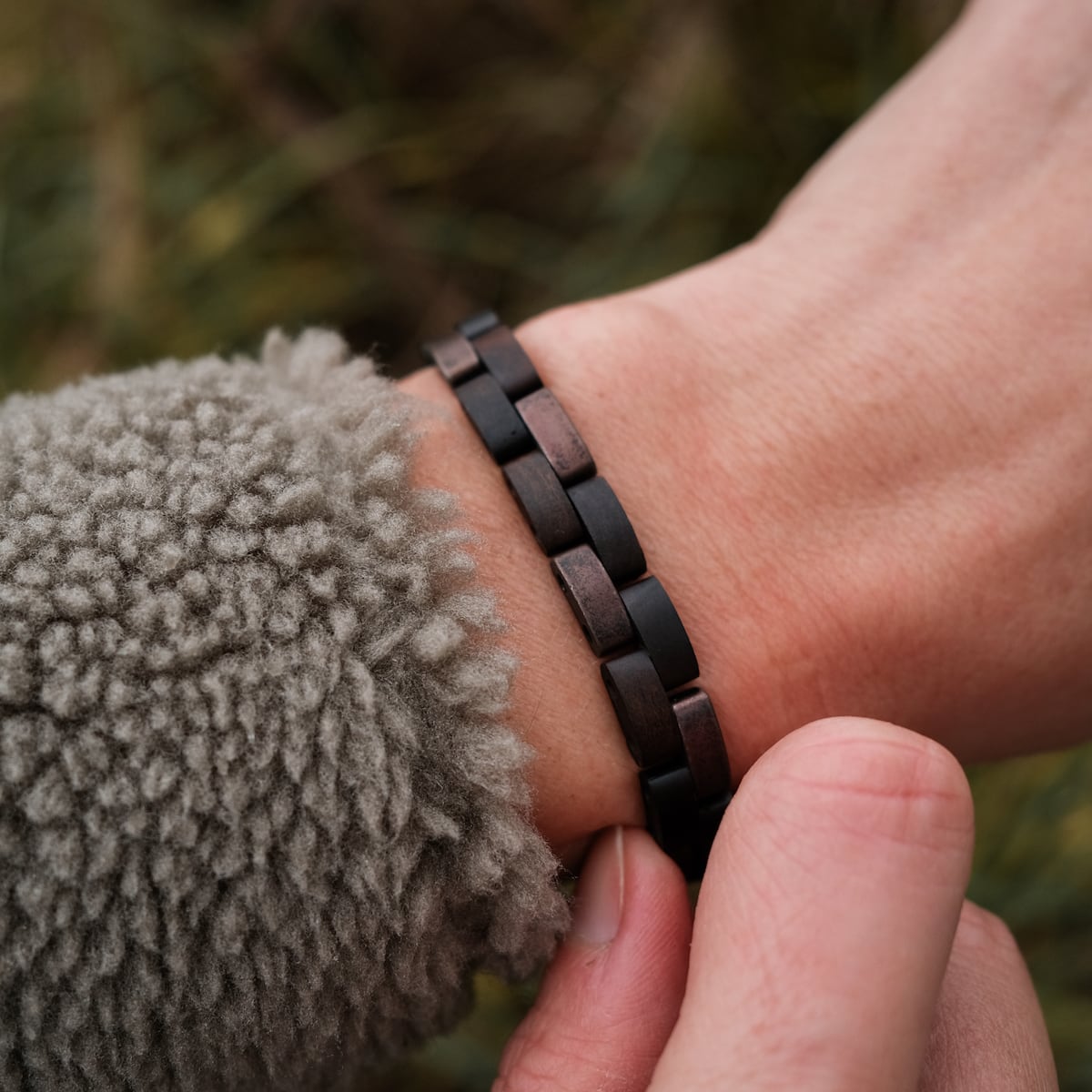 "Rondo", a bracelet featuring a blend of maple and antique copper, showcasing a rustic, stylish design.