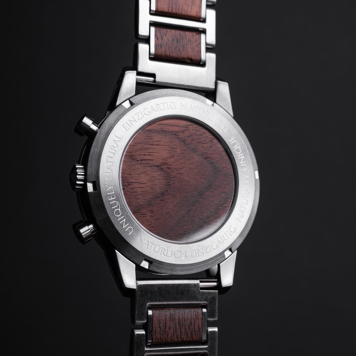 "Oscar", a stylish watch featuring walnut accents and a sleek design.
