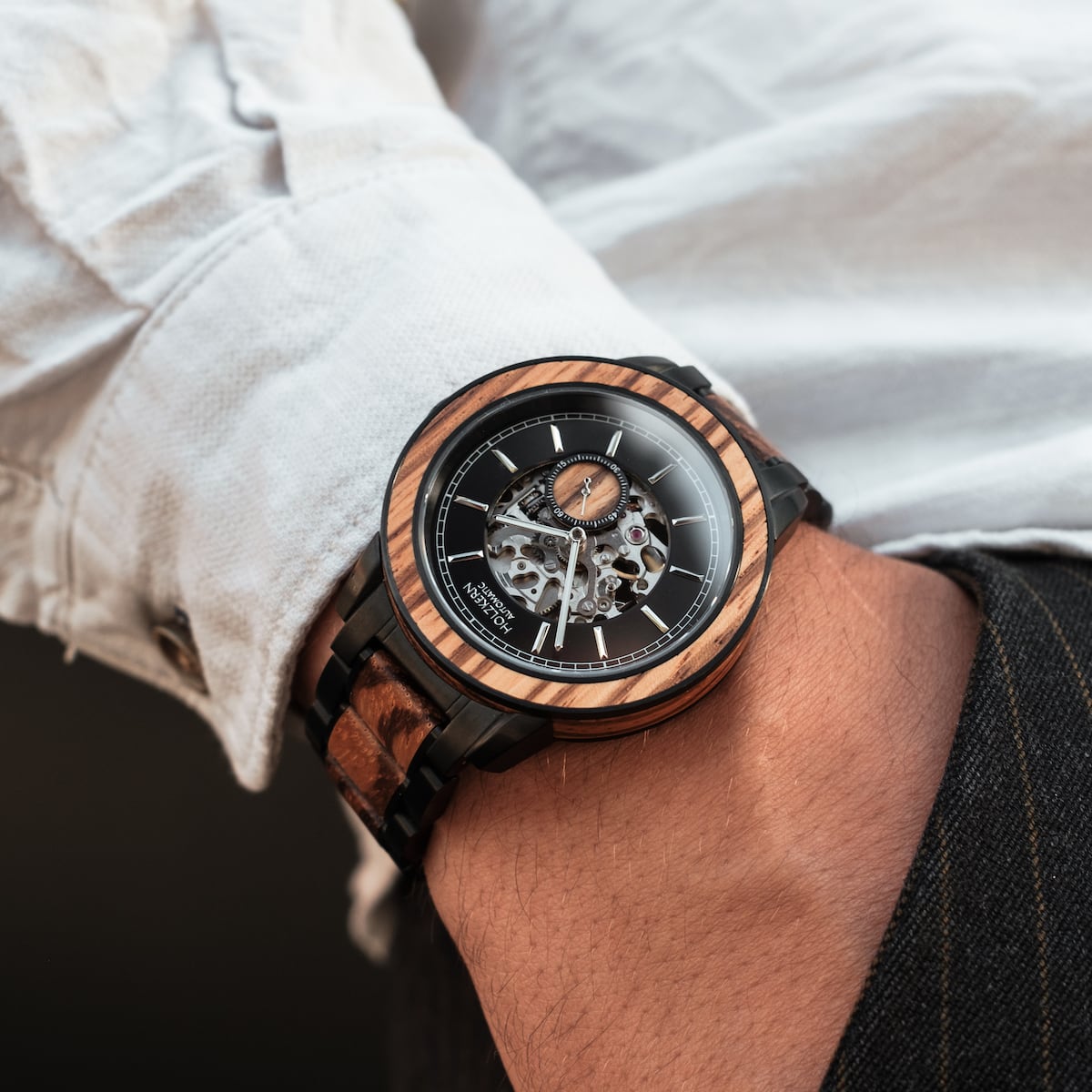 "San Juan", a stylish watch with a zebrawood finish and intricate design.