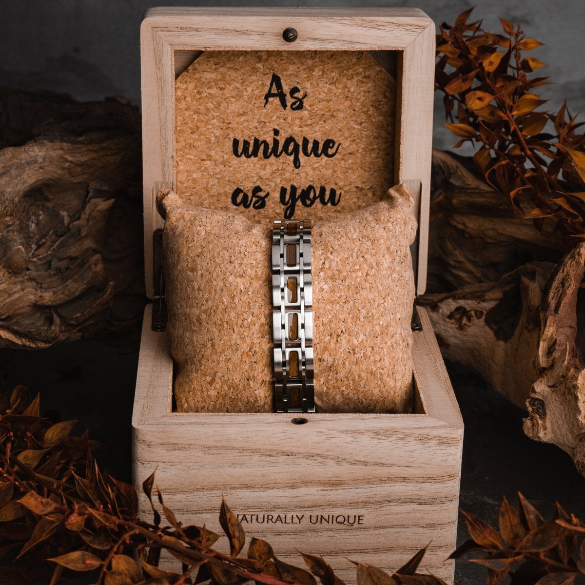 "Tremolo" watch in elegant Walnut and Silver, showcased in a natural-themed wooden box.