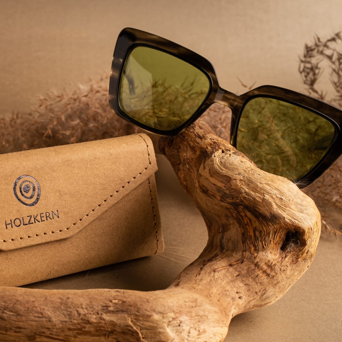 "The Exquisite sunglasses featuring a Leadwood frame and Khaki Dust lenses with a natural, rustic aesthetic."