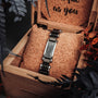 "Adagio" watch, sleek marble and gray design, nestled in a wooden box.