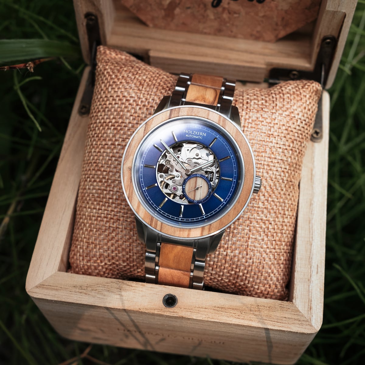 "Haiku" watch showcases a stylish blue and wooden design in an elegant wooden box.