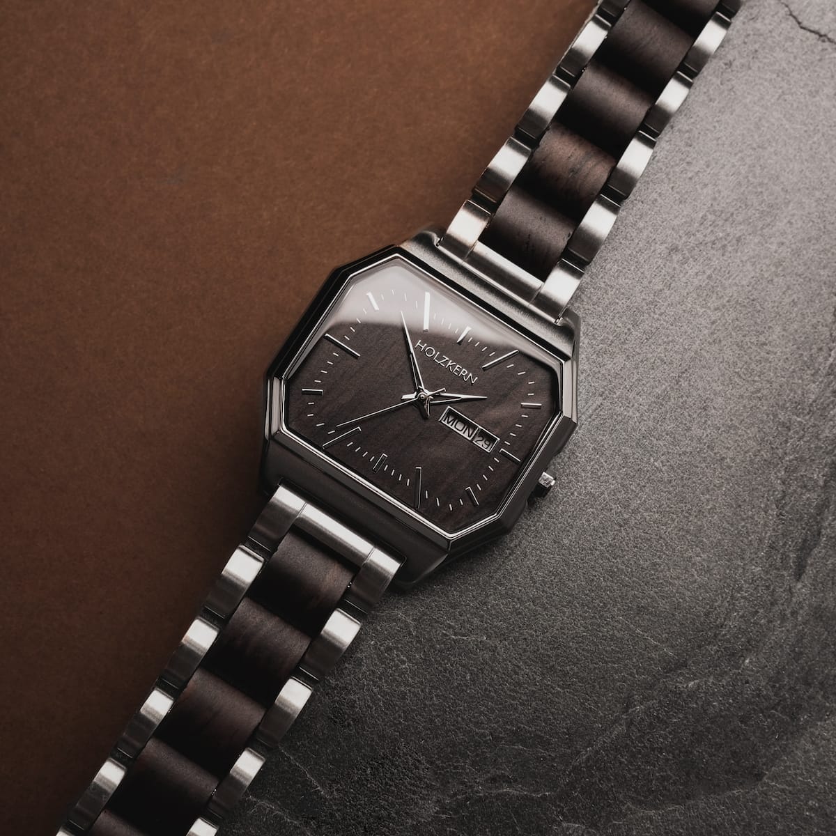 "Kéré" watch, stylish hexagonal design with dark maple wood and steel accents.