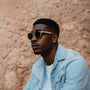 "The Hyped" sunglasses, featuring a Zebrawood and Crystal design in a stylish, modern look.