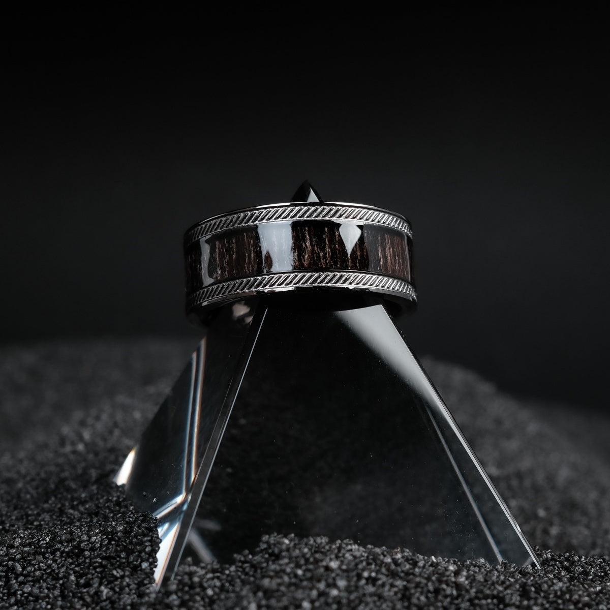 "Countless Ring", a stylish ring crafted from maple and dark gray, showcased with a modern and sleek design.