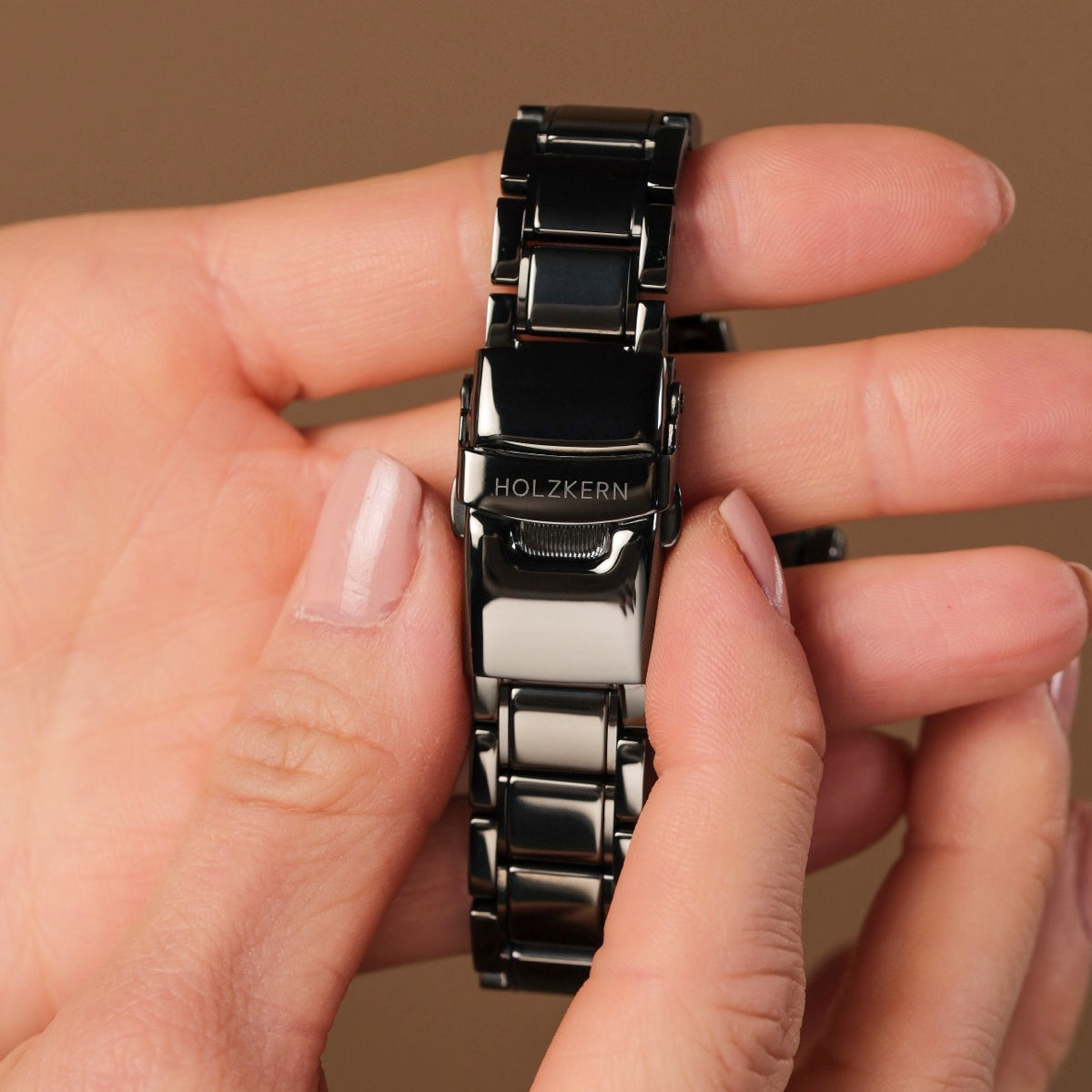 Mirrorance watch bracelet in nacre and ceramic with a sleek, reflective design.