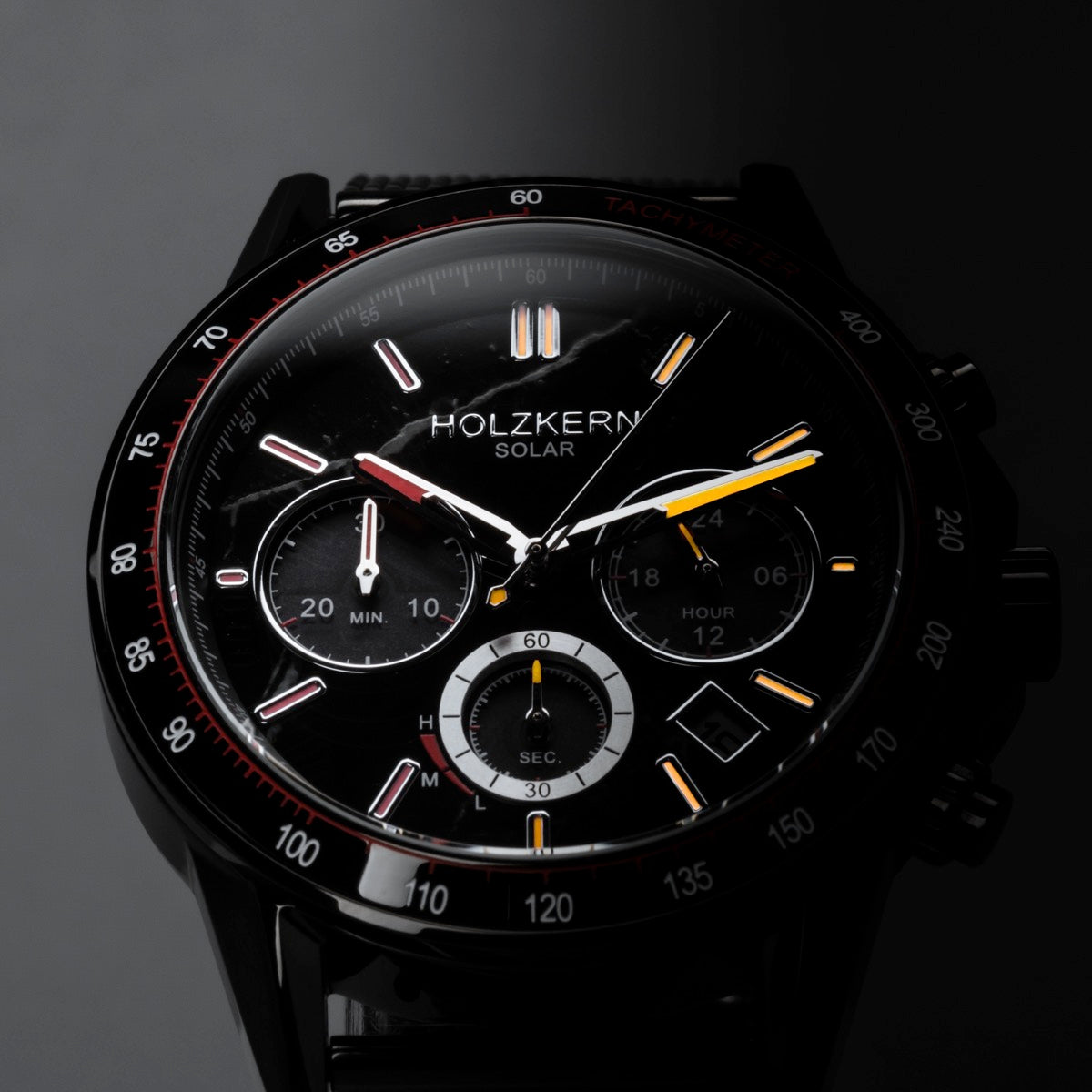 "Comfort Crusher" watch featuring a marble-black design with multiple dials and a sleek, modern style.