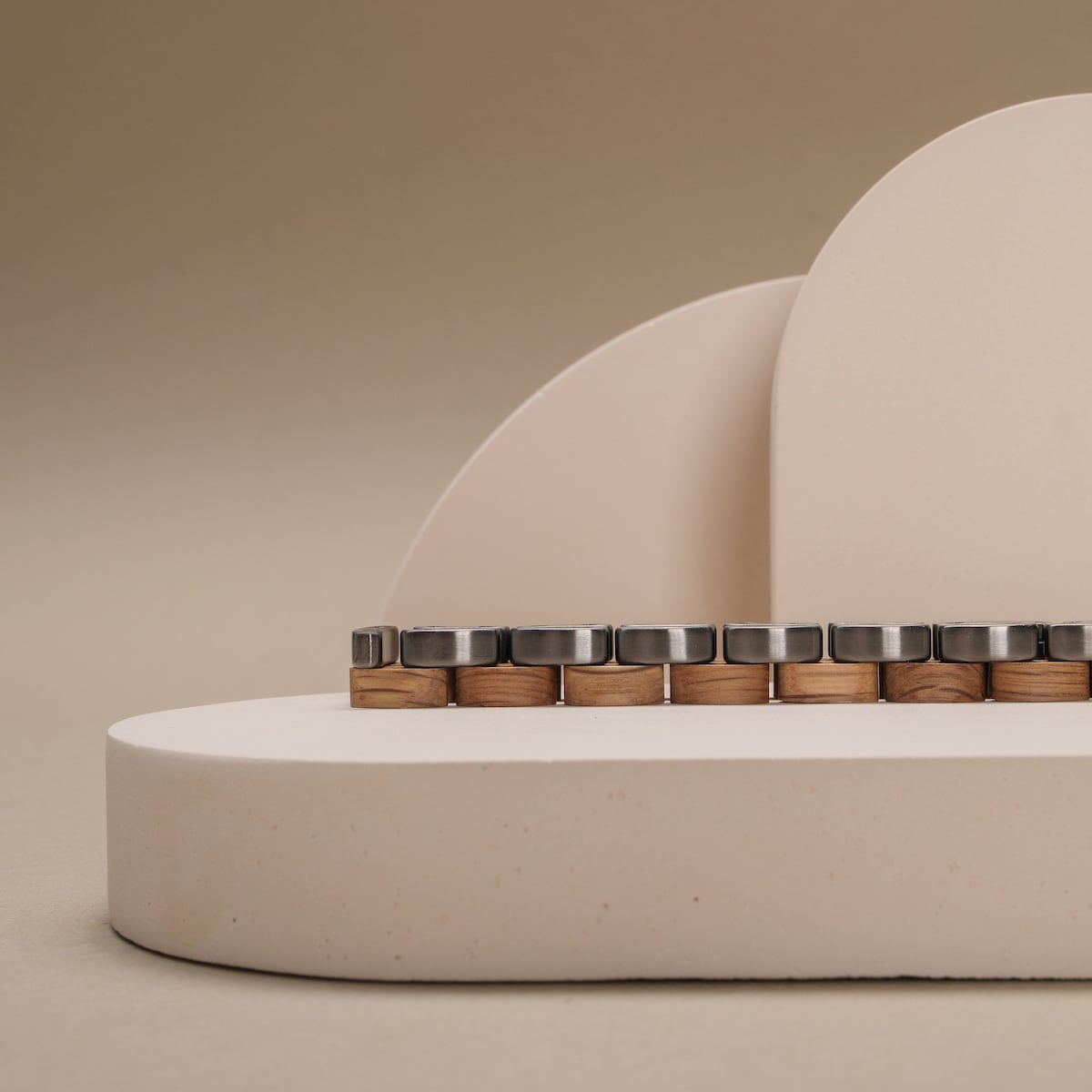 "Duet", a stylish decorative piece in oak and gray, featuring a modern, minimalist design.