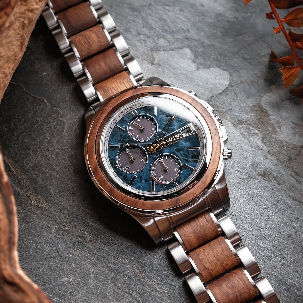 "Koh Mak" watch with a walnut and marble design, featuring a stainless steel and wooden link band.