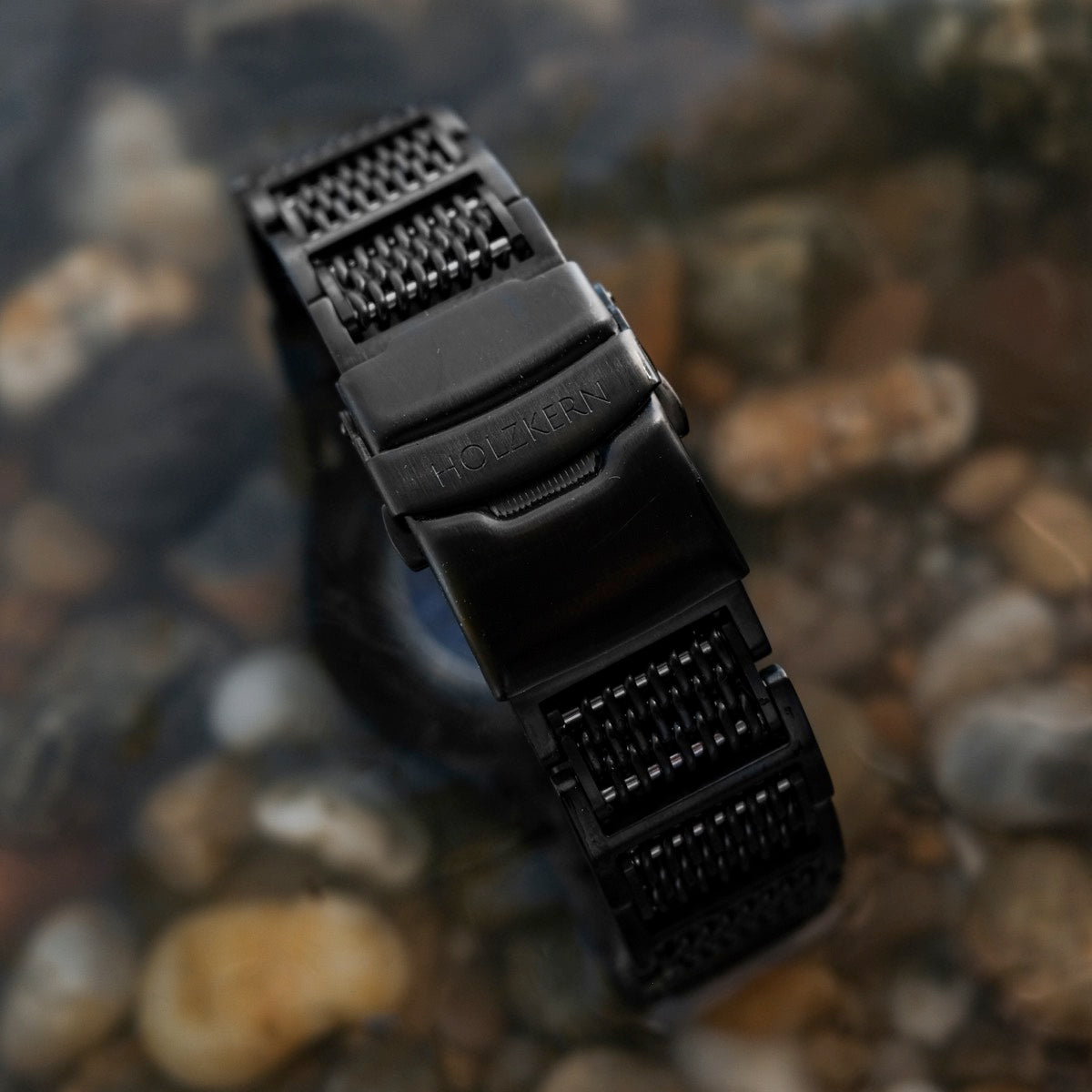 "Aoraki" watch band featuring Lapis Lazuli and black materials with a stylish, textured design.