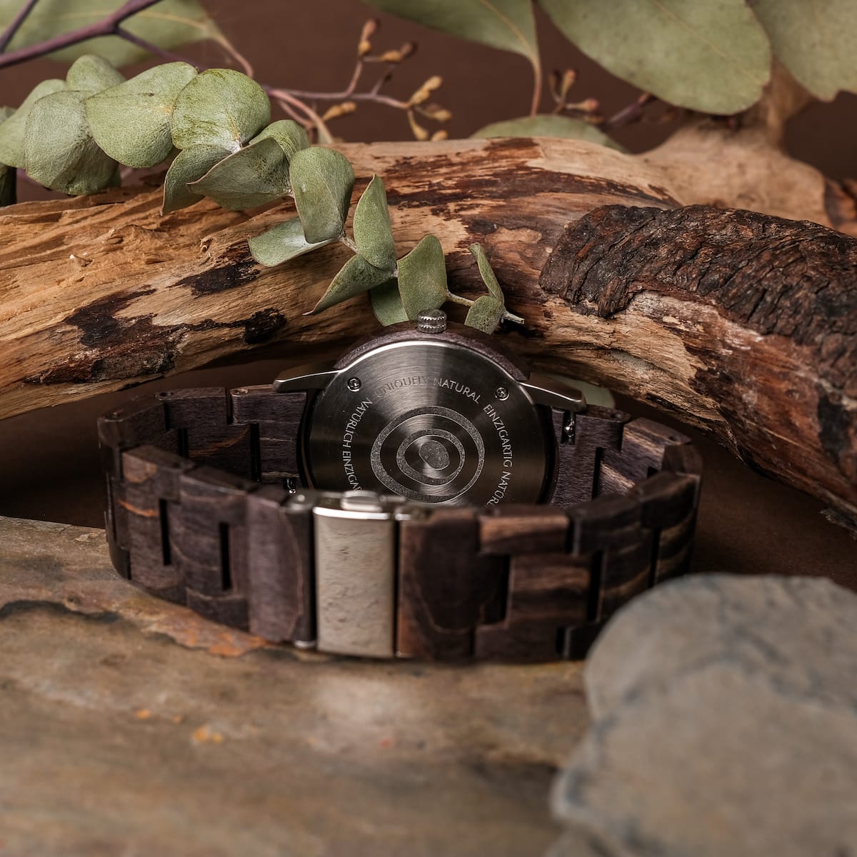 "Immanuel" watch featuring a rustic style with a maple and sodalite design, surrounded by natural wood elements.