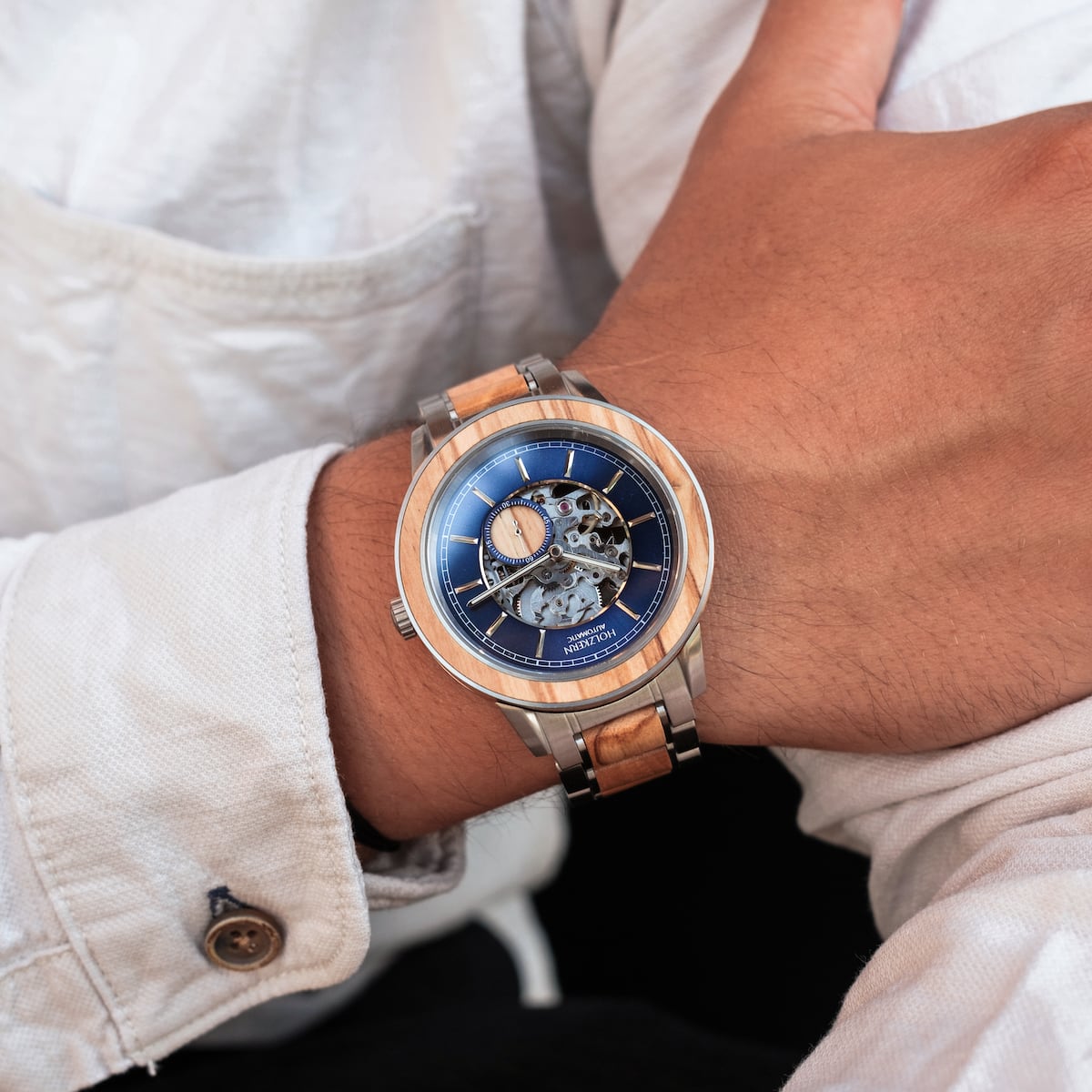 "Haiku" watch featuring a sophisticated blend of olive tones and a detailed mechanical design.