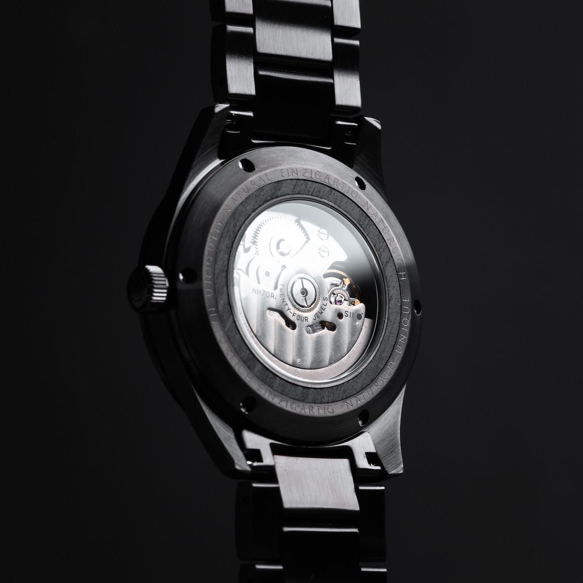"Morasko" watch featuring a sleek, dark gray design with visible mechanical details.