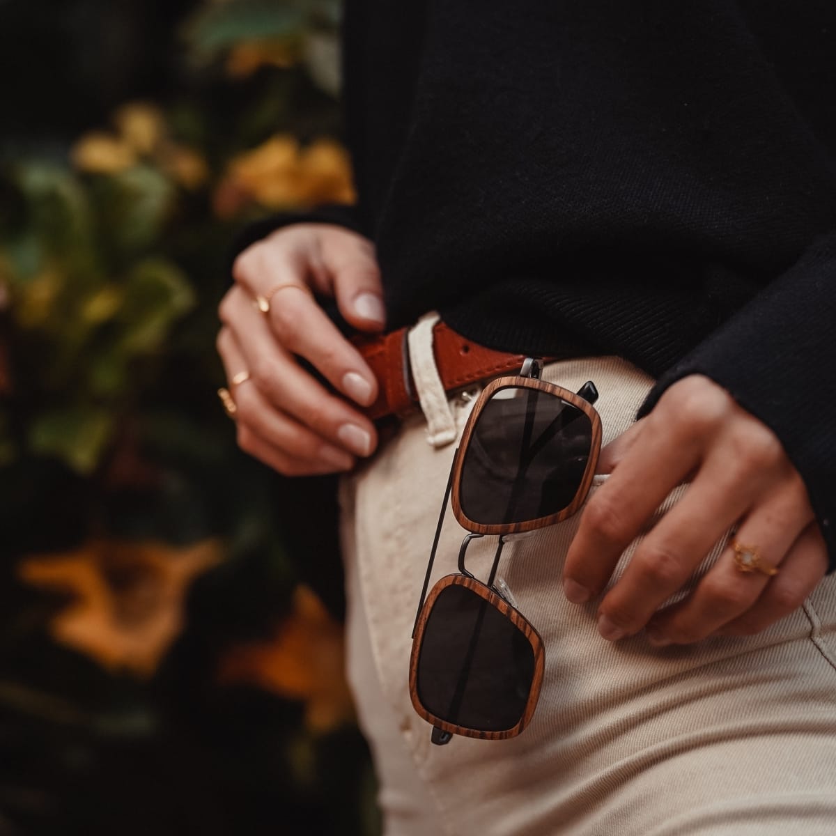 "The Logician" sunglasses featuring zebrawood frames and a dark grey stylish design.