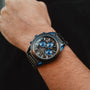 "Intergalactic watch featuring a leadwood and marble design with a sleek, modern aesthetic."