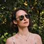 "The Badass II" sunglasses featuring a stylish Leadwood frame and Antique Silver accents.
