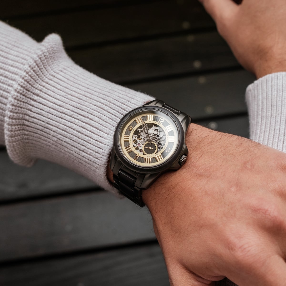 "Navona" watch featuring a sleek, modern design with a maple-colored dial and matching strap.