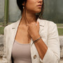 "Duet" bracelet, featuring an oak and gray design, exudes a sophisticated and modern style.