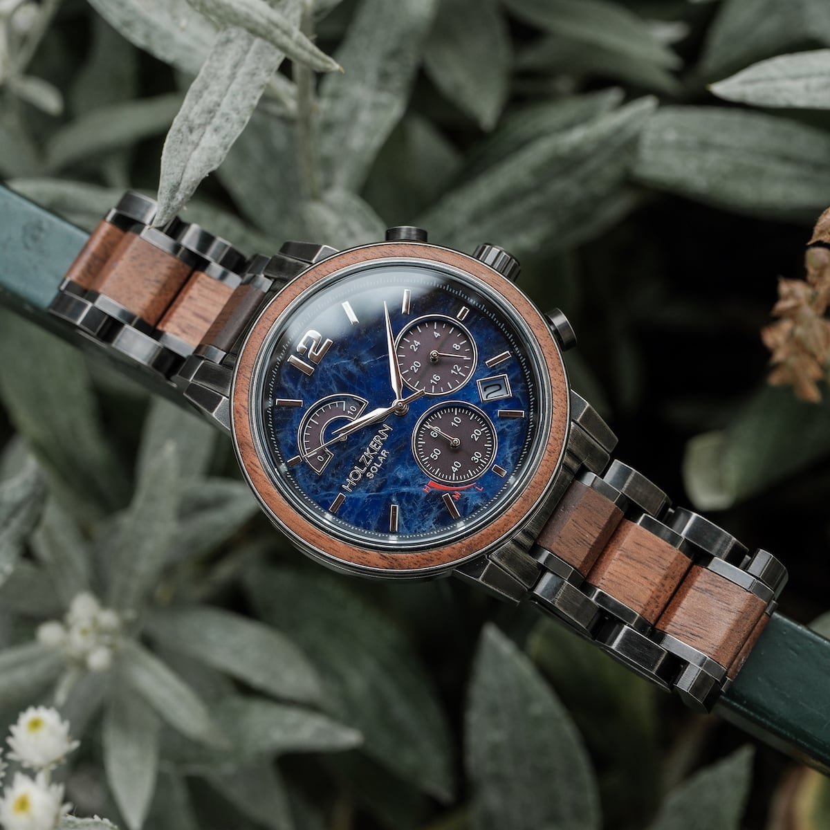 Syntonize watch, featuring a classic design with a sodalite blue face and walnut accents.
