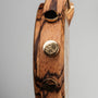 "Canopy" watch featuring an elegant zebrawood case and marble accents, showcasing intricate gold detailing.