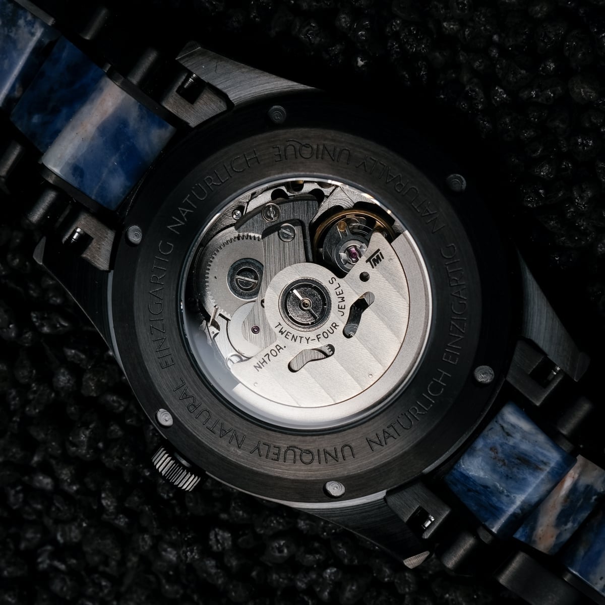 "Vredefort" watch showcasing a sophisticated marble and black aesthetic with intricate mechanical details.