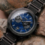"Aoraki" watch, featuring a lapis lazuli dial and black finish with a rugged, elegant design.
