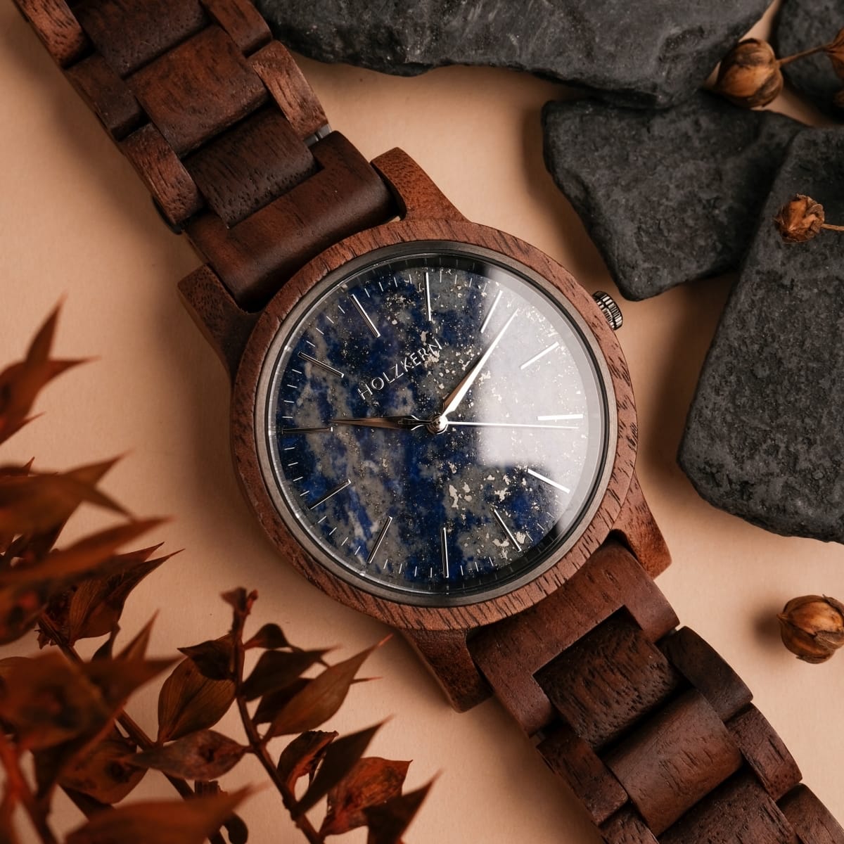 "Summer Evening" watch with walnut wood and lapis lazuli face, featuring a natural, earthy aesthetic.
