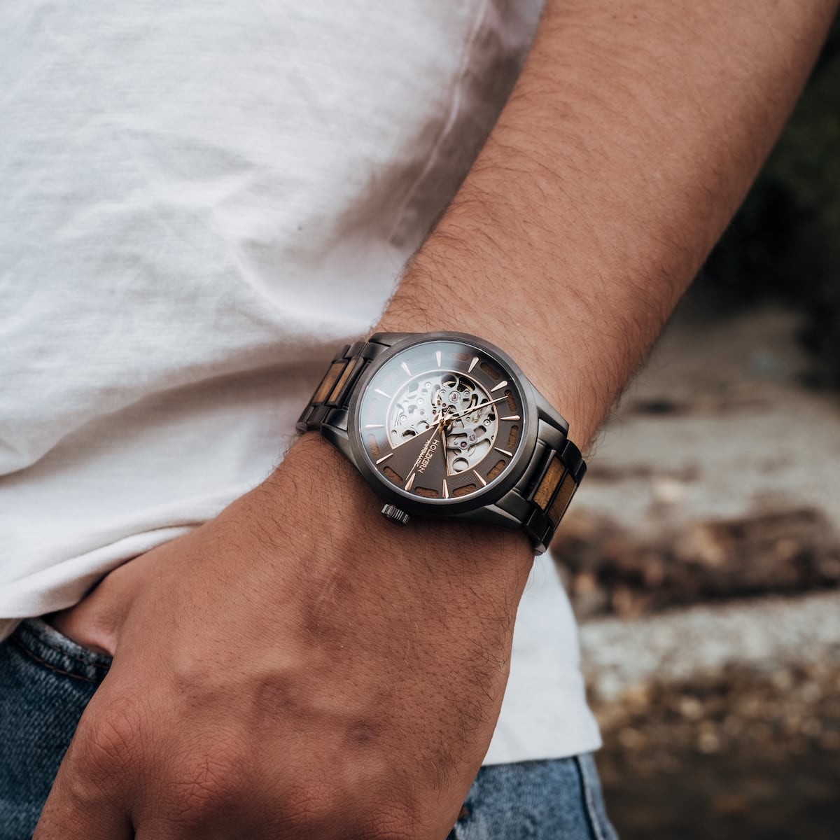 "Tenoumer" wristwatch, featuring a koa wood and dark gray color scheme.