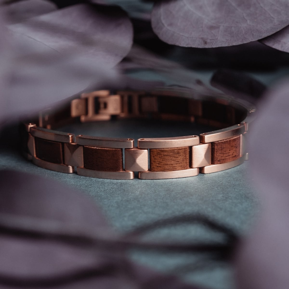 "Rhapsody" bracelet featuring walnut and rose gold accents in a sophisticated design.