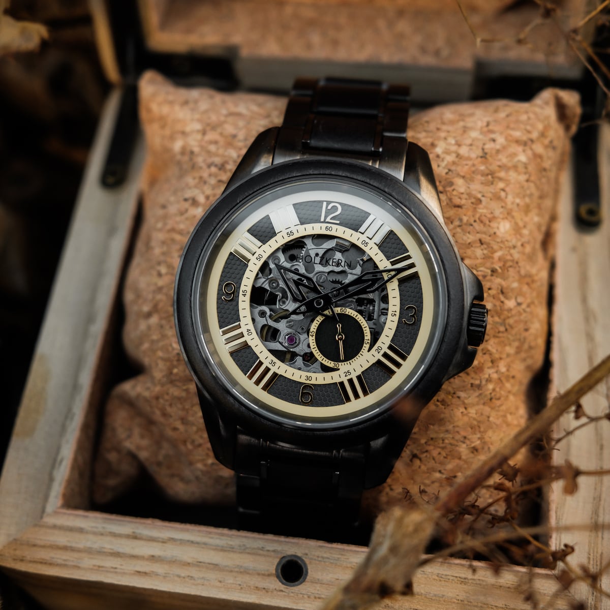 "Navona" watch with a sophisticated maple-on-maple design and intricate dial detailing.