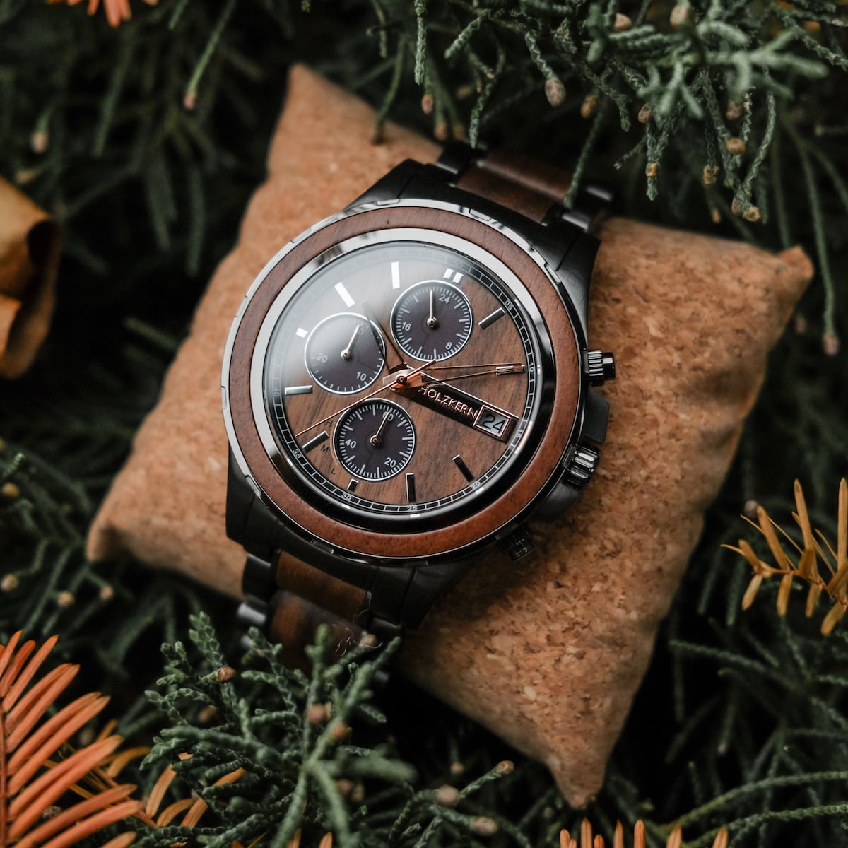 "Lipan" watch, featuring a walnut design, nestled in greenery for an elegant and natural look.
